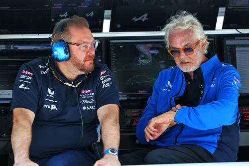 Flavio Briatore looking at his watch