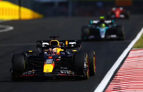 Max Verstappen drives ahead of Lewis Hamilton and Charles Leclerc at the 2024 Hungarian Grand Prix.