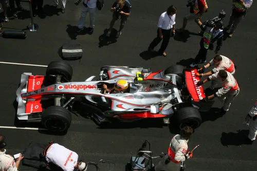 Hamilton being pushed to the grid in Brazil 2007