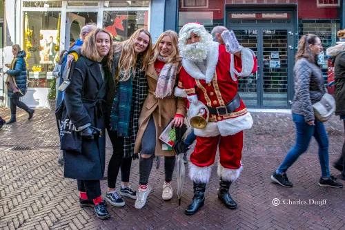 dames met kerstman