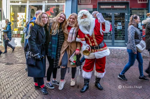 dames met kerstman