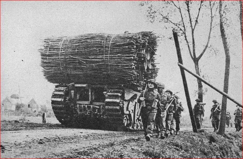 3 avre tank met takkenbossen voor oversteek sloot of beek