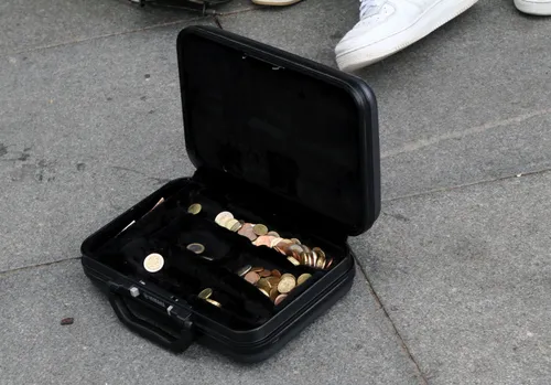 Gatvės muzikantų trio abejingų nepalieka / M. Patašiaus nuotr.