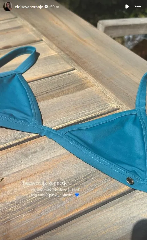 eloise van oranje doet zwemtopje uit om aan iedereen te laten zien