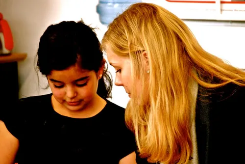 coach en meisjeyoung