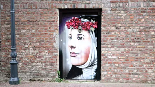 sint rosa op tuindeur woning begijnenhofstraat aan kerkplein