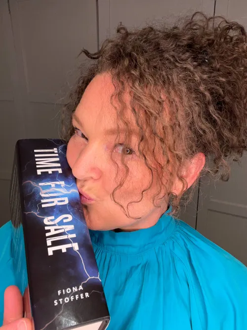 Author pic 7_with book