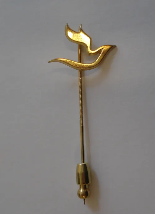 speldje van verdienste staand