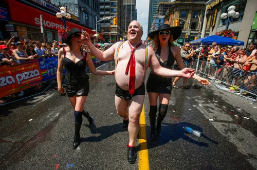 a man is dressed to mock toronto mayor rob ford during the worldpride gay pride parade in toronto in june