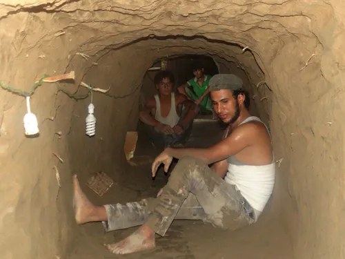 others create spaces away from their homes here residents dig tunnels and caves in the mountains of deir al zor where they plan to seek shelter whenever bombs begin falling