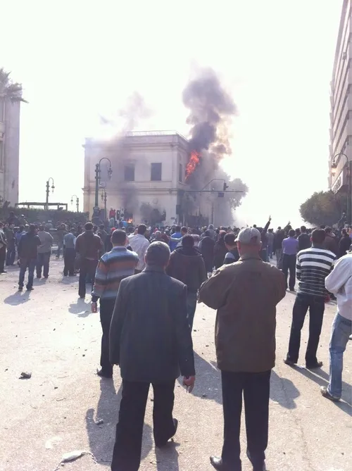 sharifkouddous large explosion blows out widows of building fire raging inside