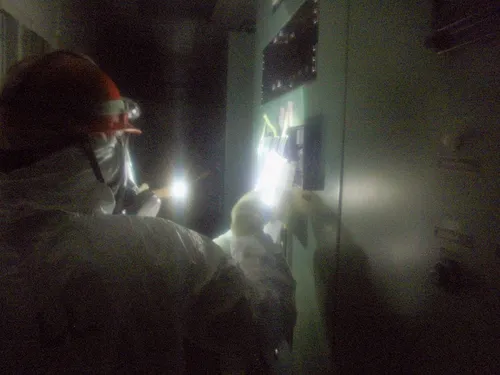 when they take a break the workers rest and eat in a small decontaminated room