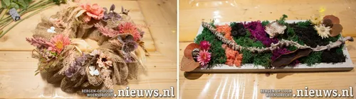 &nbsp;Zijden bloemen in een krans en een mos 'schilderij'