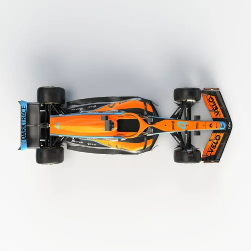 <i>Zie je hoe het chassis na de radiatoren geleidelijk afloopt naar de diffuser? Op deze manier hoopt de Britse renstal de effectiviteit van het onderdeel te vergroten. Bij Aston Martin is er van dit geleidelijke patroon nauwelijks sprake. (Foto: McLaren F1 Media)</i>