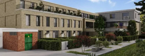 De vier gezinswoningen.