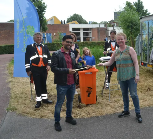 gouden knijper overhandigd