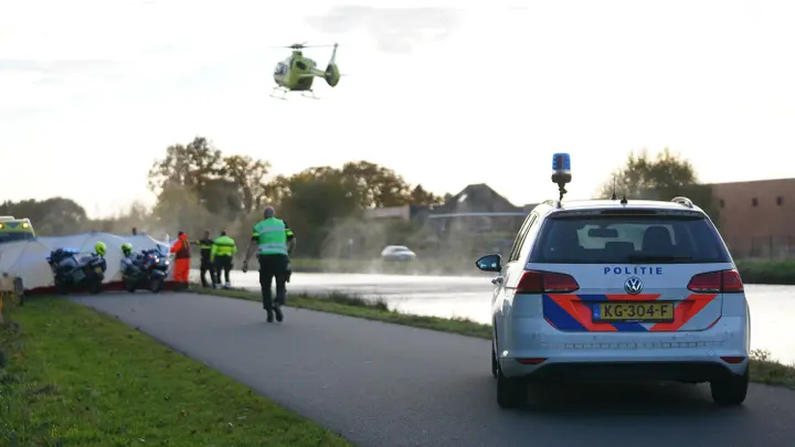 Fietser te water in Assen