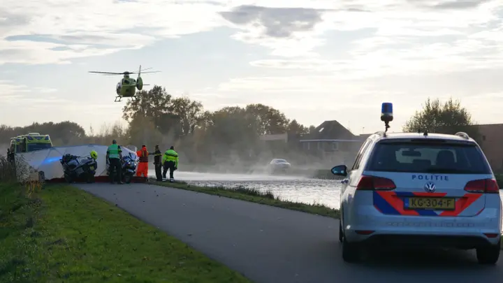 Fietser te water in Assen