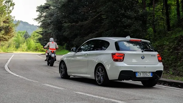 BMW Serie 1 M135i e Husqvarna Nuda 900R