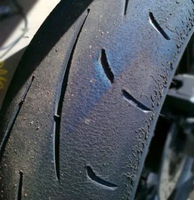 pneu piste moto bleu 387x400