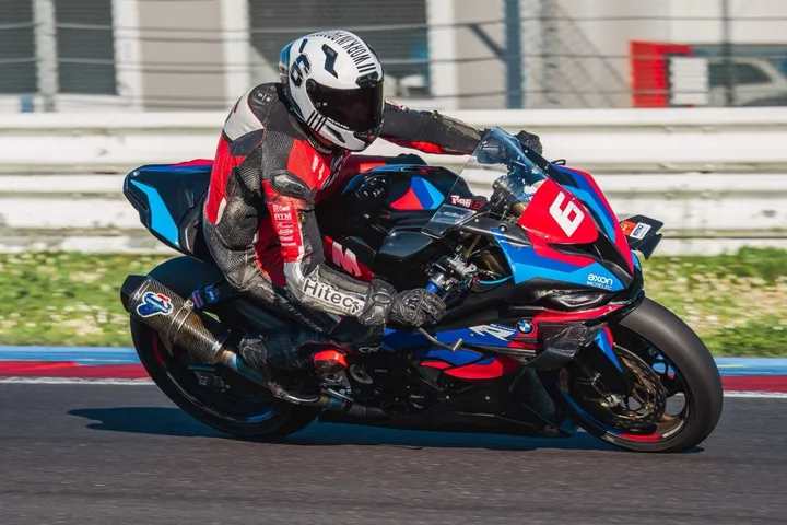 Emanuele Pusceddu with Axon Seven Team’s BMW S 1000 RR (credit: Daniele Guazzetti)
