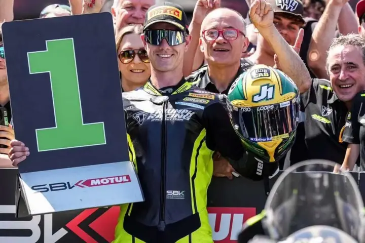 Tom Booth-Amos celebrates with the PTR Triumph Supersport team at Donington Park