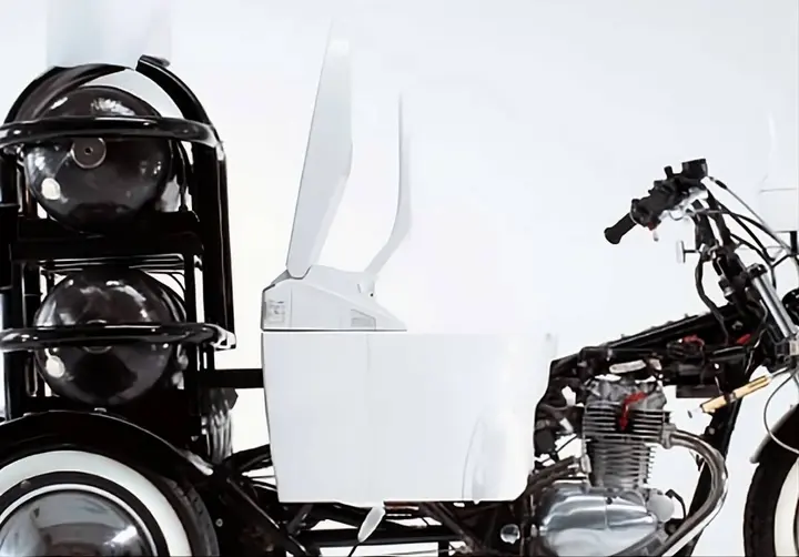 Toilet Bike Neo three-wheeler with toilet seat, created by TOTO in 2011 for an environmental campaign