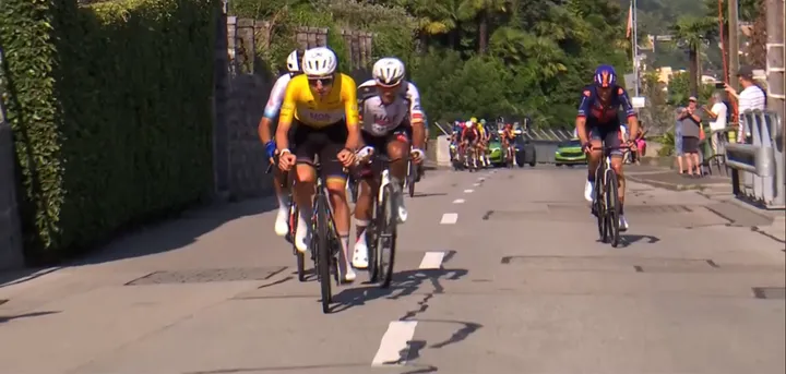 Tadej Pogacar setting a strong pace on the Via Consiglio Mezzano climb for Jhonatan Narváez.