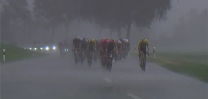 Heavy rain lashed the riders while a strong crosswind swept across the road. In those conditions, it was hard to tell who's who in the peloton.