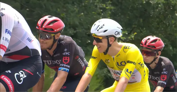 Tadej Pogacar talking to Matteo Trentin during stage 7 of the Tour de France