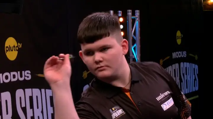 Henry Coates throwing the dart