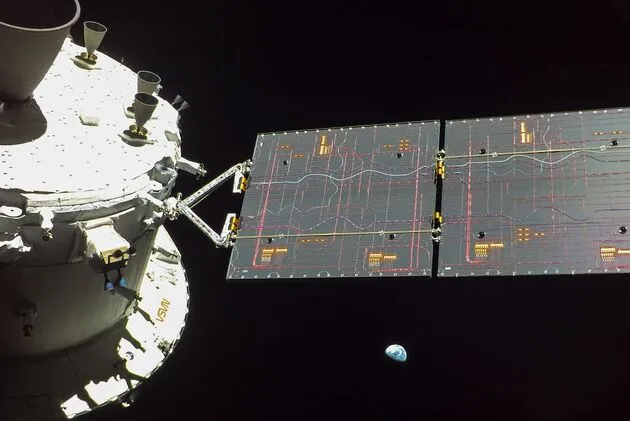 Orion en de aarde (Foto; NASA)