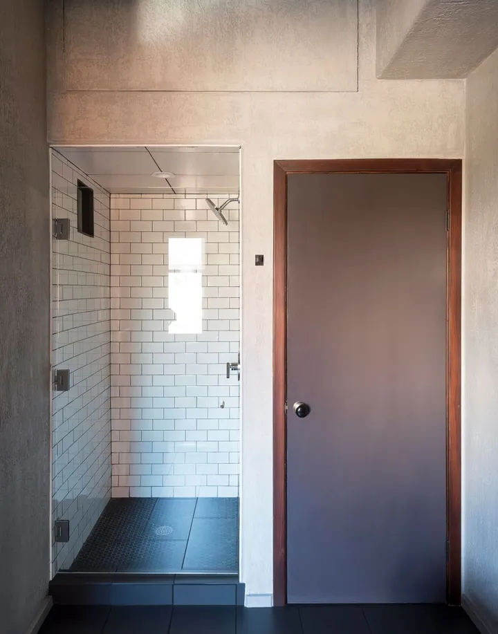 wm mulherins sons hotel bathroom shower by matthew williams