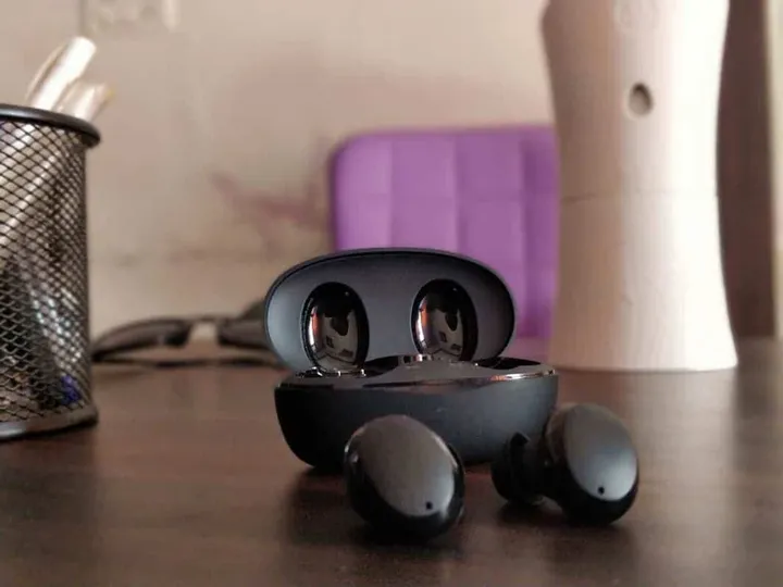baseus encok w11 true wireless earbuds on table view