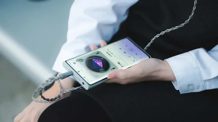 miad 01 with headphones