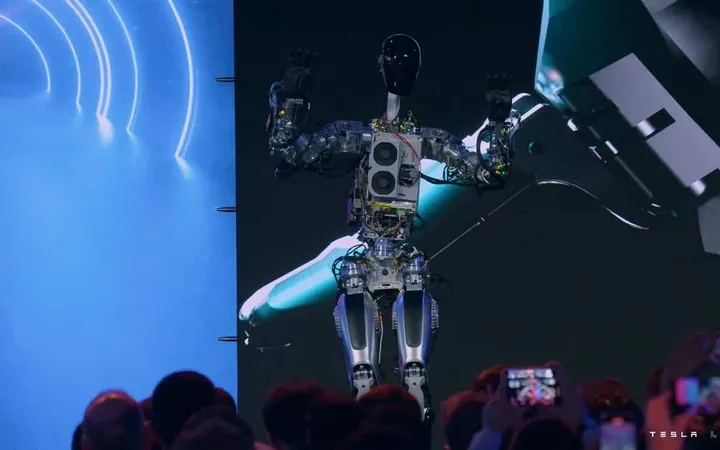 tesla unveils optimus its futuristic humanoid robot for less than