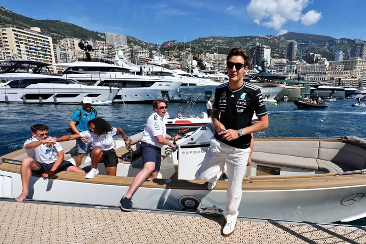 George Russell gets a boat to work during the Monaco GP