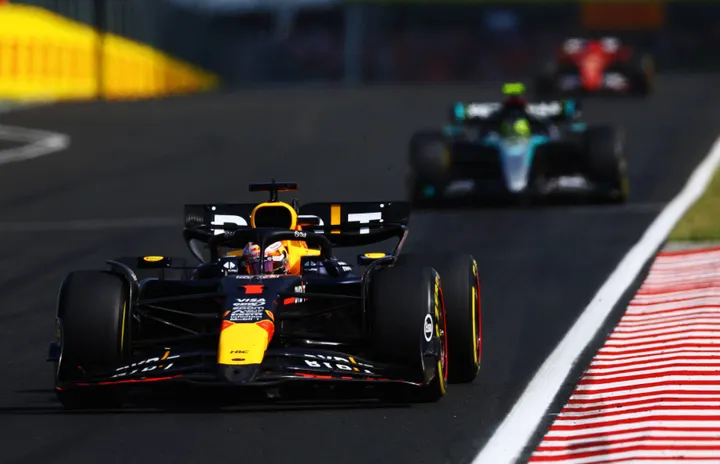 Max Verstappen drives ahead of Lewis Hamilton and Charles Leclerc at the 2024 Hungarian Grand Prix.