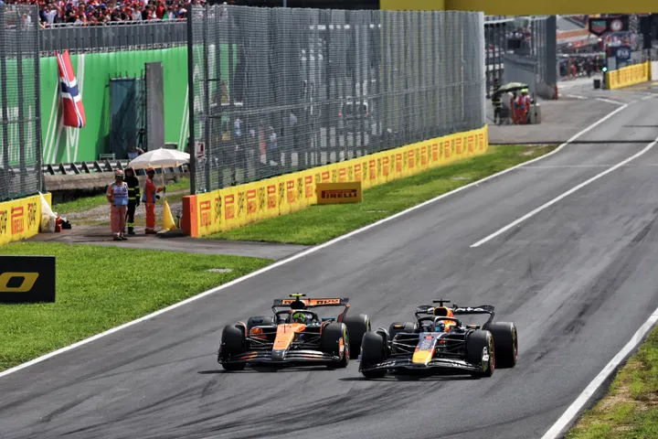 Lando Norris en Max Verstappen tijdens de Grand Prix van Italië