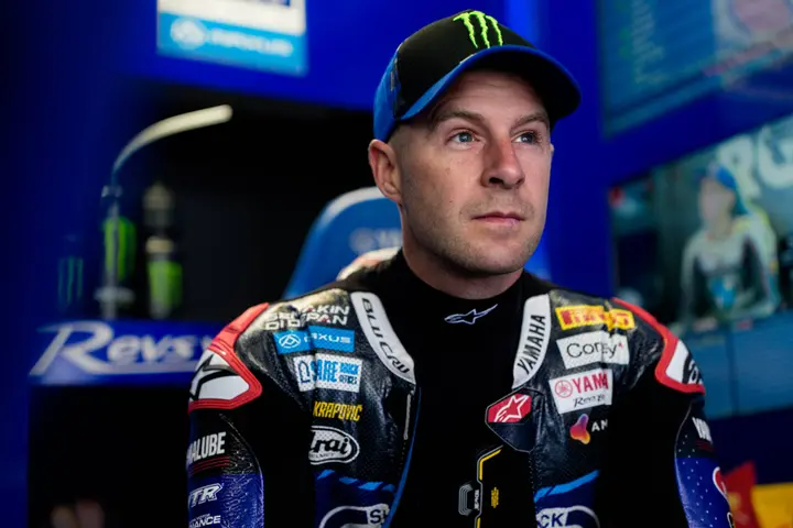 Jonathan Rea sits in his Superbike garage
