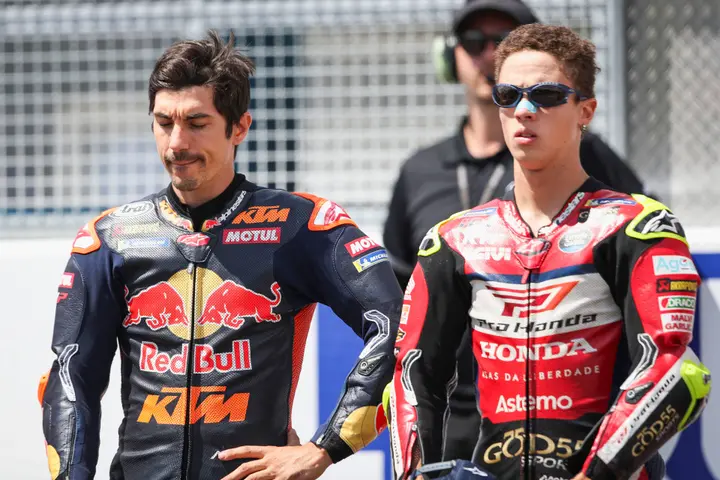 Maverick Vinales stands with Diogo Moreira