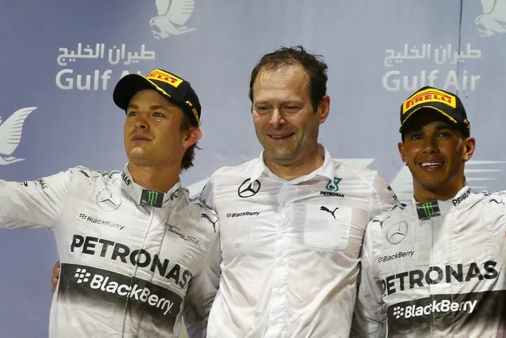The podium (L to R): Nico Rosberg (GER) Mercedes AMG F1, second; Aldo Costa (ITA) Mercedes AMG F1 Engineering Director; race winner Lewis Hamilton (GBR) Mercedes AMG F1; Sergio Perez (MEX) Sahara Force India F1, third.Bahrain Grand Prix, Sunday 6th April 2014. Sakhir, Bahrain.