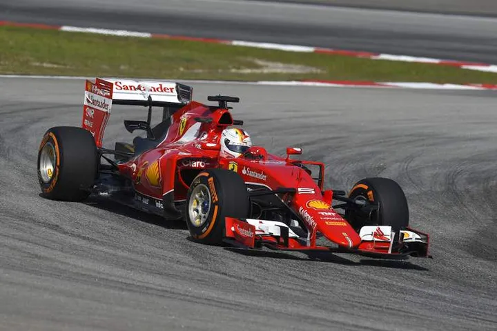 Vettel+Malaysia+Ferrari