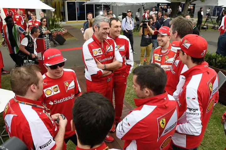 Ferrari team Raikkonen Vettel Arrivabene Melbourne