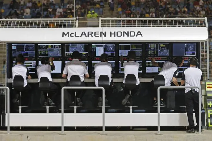 The McLaren-Honda engineers on the pit wall.