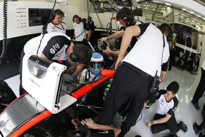 Fernando Alonso in the garage.