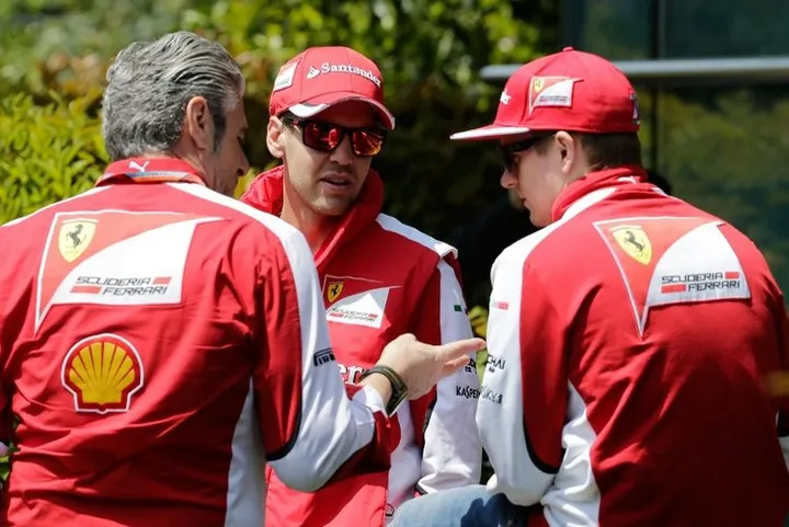 maurizio-arrivabene-sebastian-vettel-kimi-raikkonen