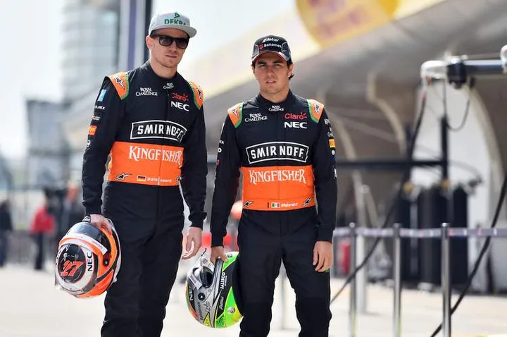 (L to R): Nico Hulkenberg (GER) Sahara Force India F1 with team mate Sergio Perez (MEX) Sahara Force India F1.Chinese Grand Prix, Thursday 9th April 2015. Shanghai, China.