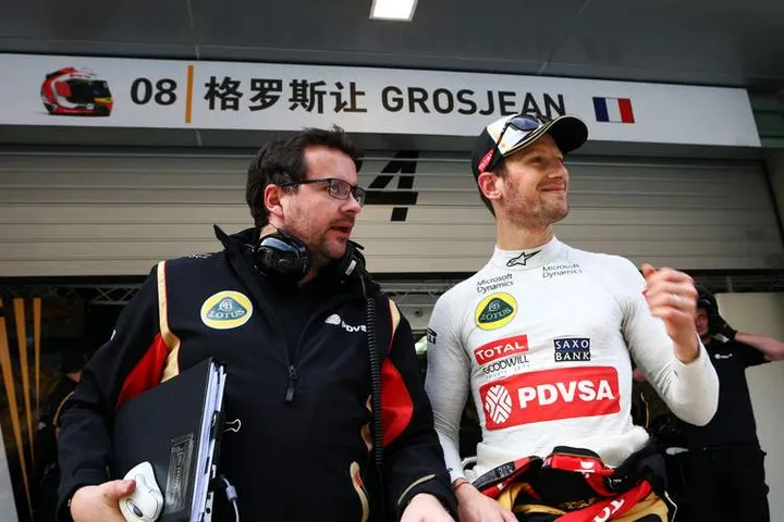 (L to R): Julien Simon-Chautemps (FRA) Lotus F1 Team Race Engineer with Romain Grosjean (FRA) Lotus F1 Team.Chinese Grand Prix, Friday 10th April 2015. Shanghai, China.