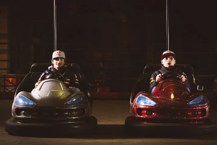 Toro Rosso pilots Carlos Sainz Jr. and Max Verstappen performs on bumper cars in Tibidabo funfair, Barcellona, Spain on the 17th february 2015